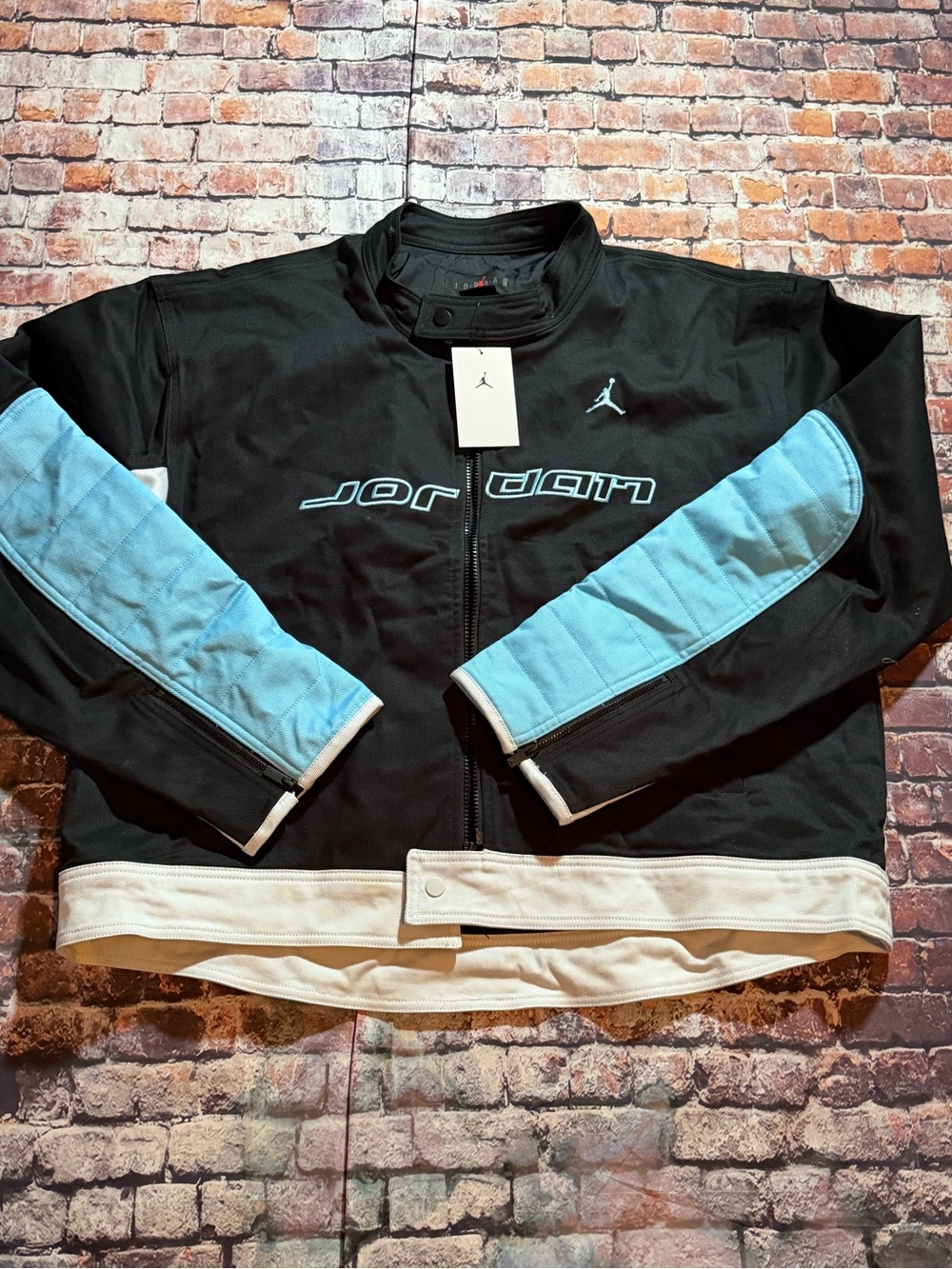 Jordan Black Jacket with Light Blue Sleeve Panels and White Trim